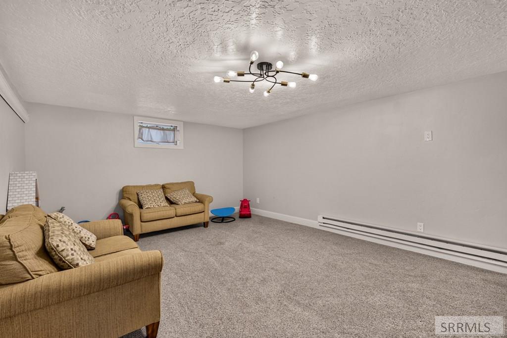 3974 East Wanda Ammon, ID 83406 - Photo 37 of 66 Basement Family Room