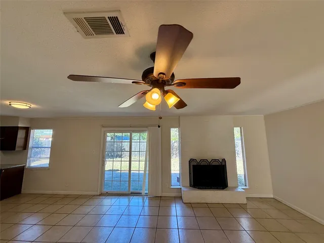 a kitchen with stainless steel appliances granite countertop a sink and a refrigerator