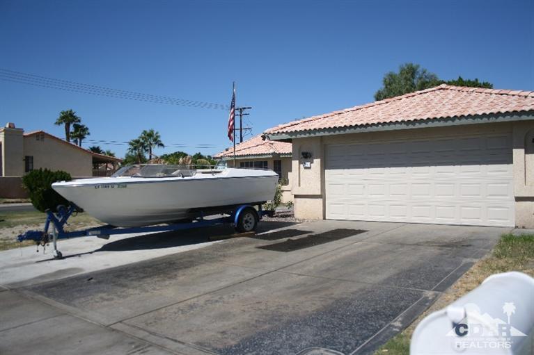68520 Concepcion Road Cathedral City, CA 92234 - Photo 3 of 7 a living room with a couch