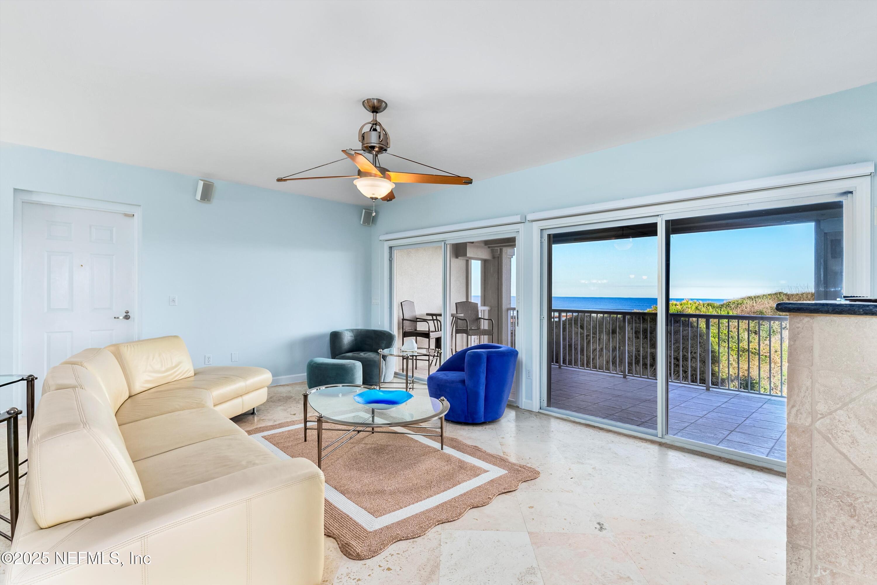 7790 A1A South, Unit 104 St. Augustine, FL 32080 - Photo 26 of 51 a living room with furniture