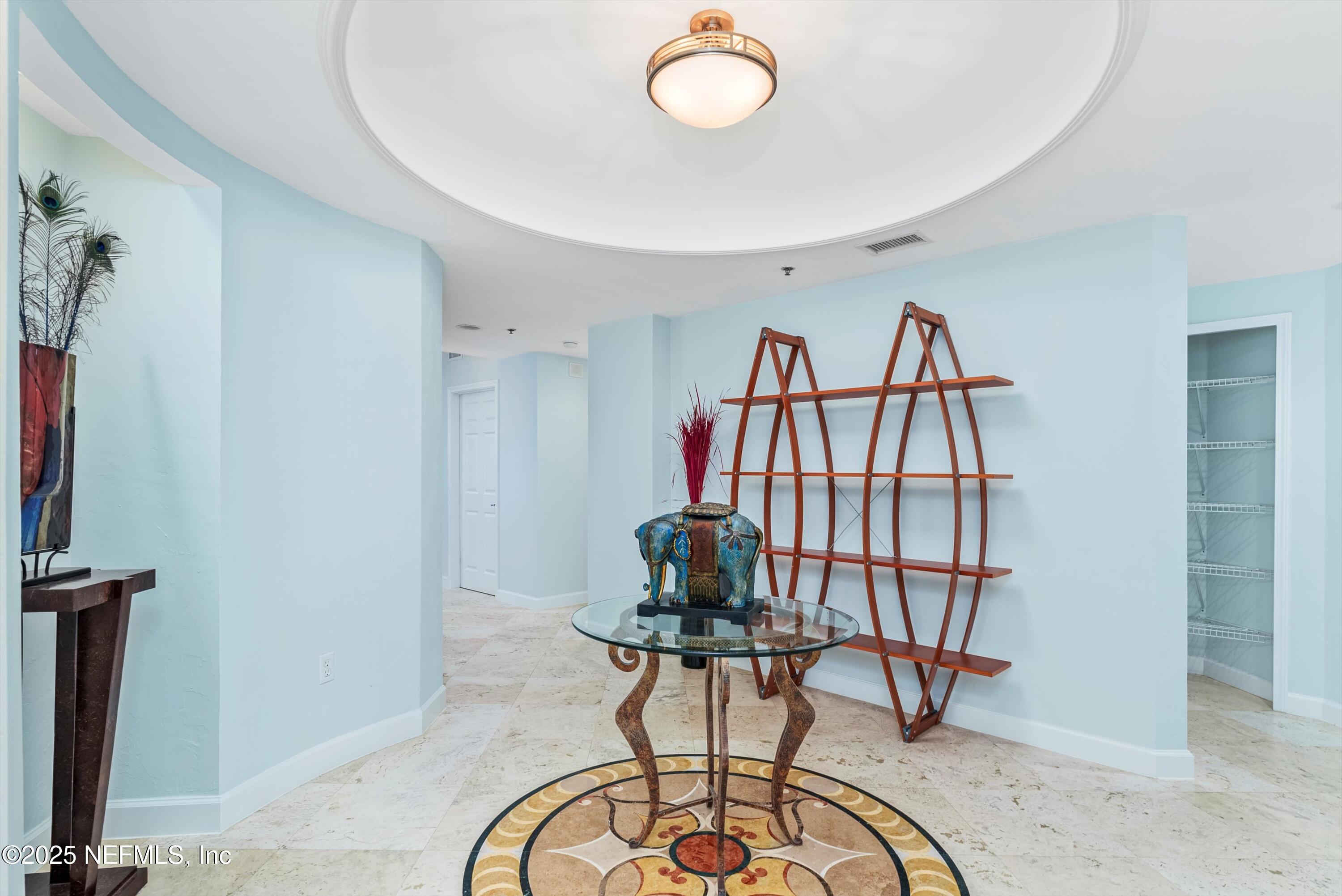 7790 A1A South, Unit 104 St. Augustine, FL 32080 - Photo 3 of 51 a view of a livingroom with furniture