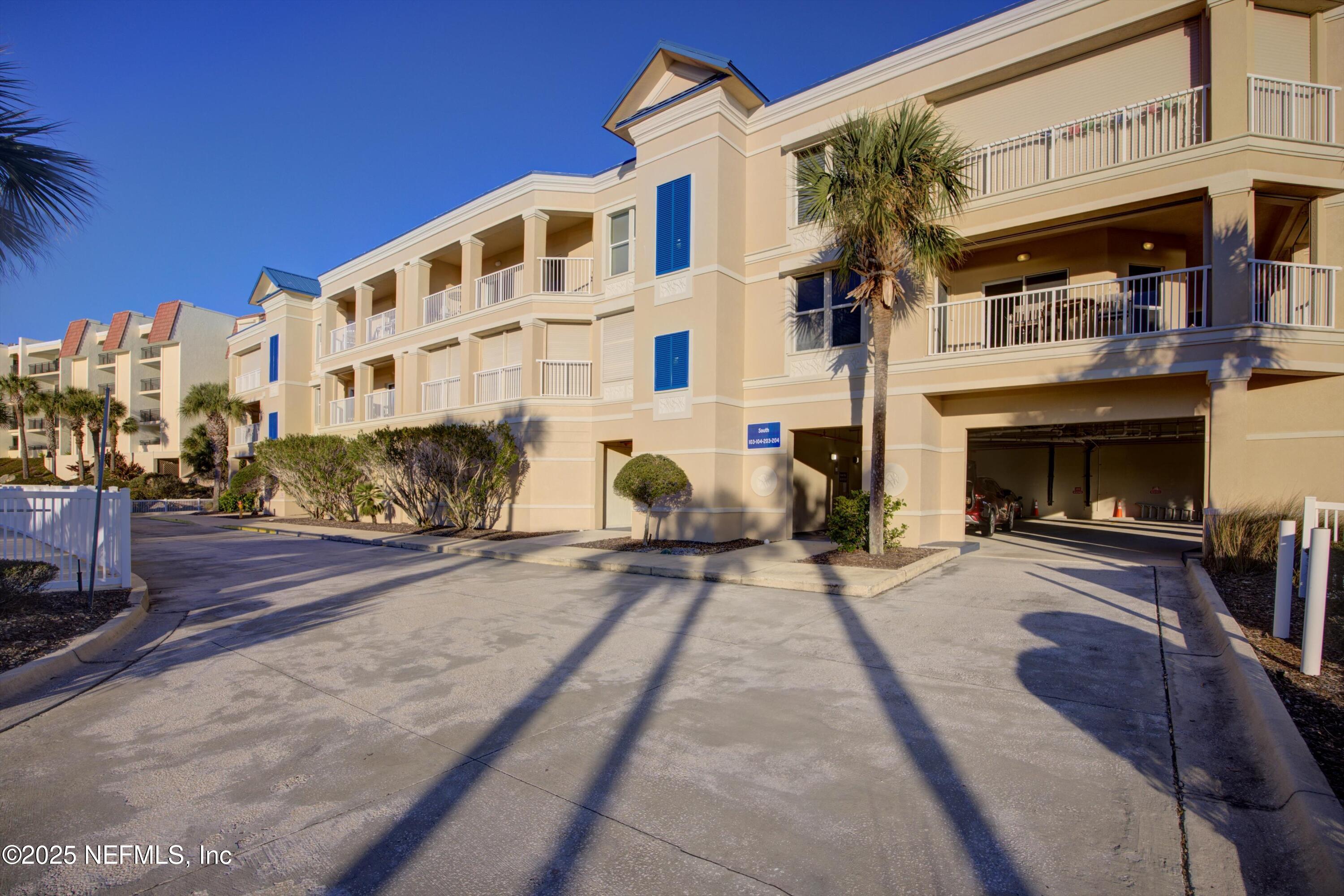 7790 A1A South, Unit 104 St. Augustine, FL 32080 - Photo 50 of 51 a view of a building with a street