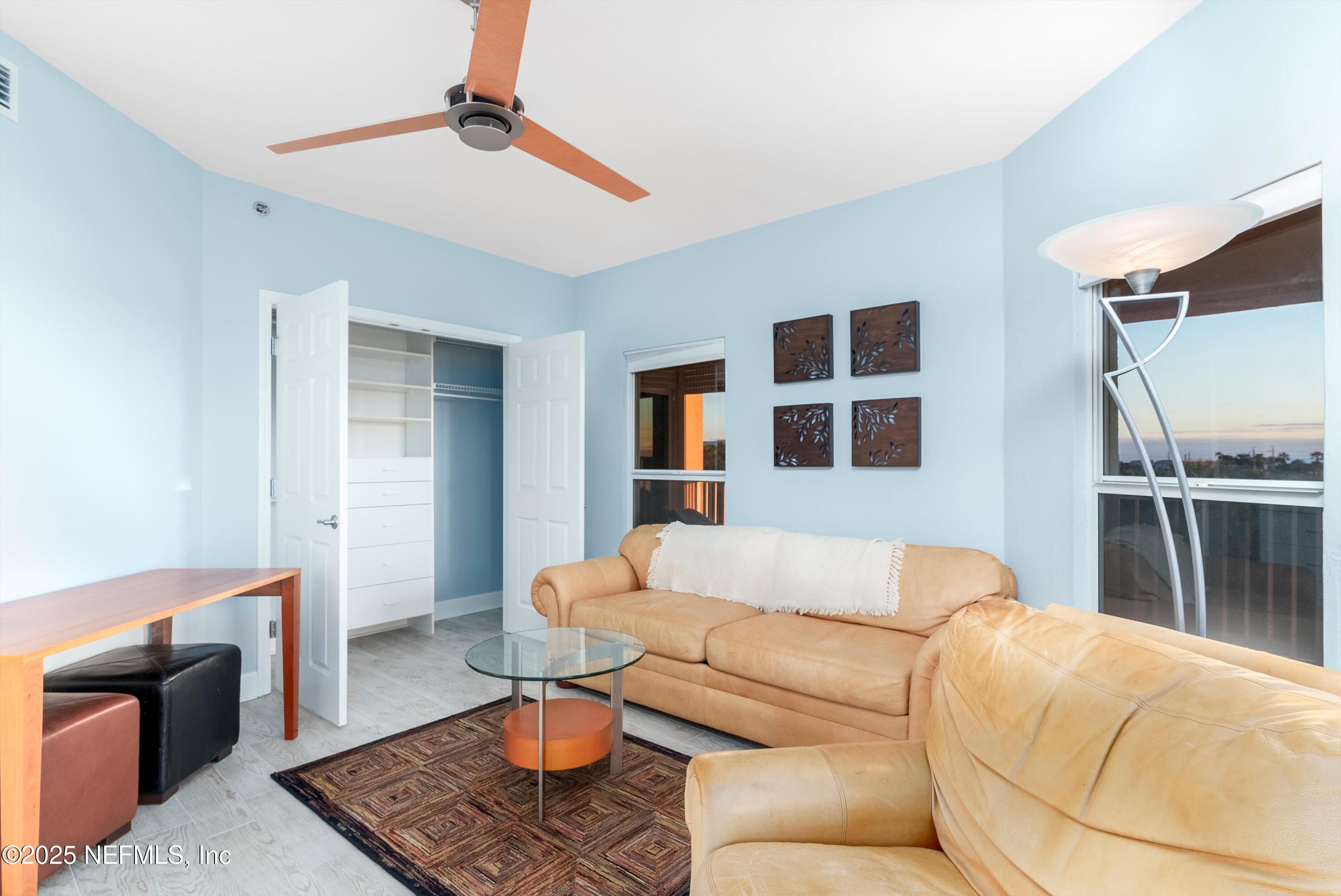 7790 A1A South, Unit 104 St. Augustine, FL 32080 - Photo 7 of 51 a living room with furniture