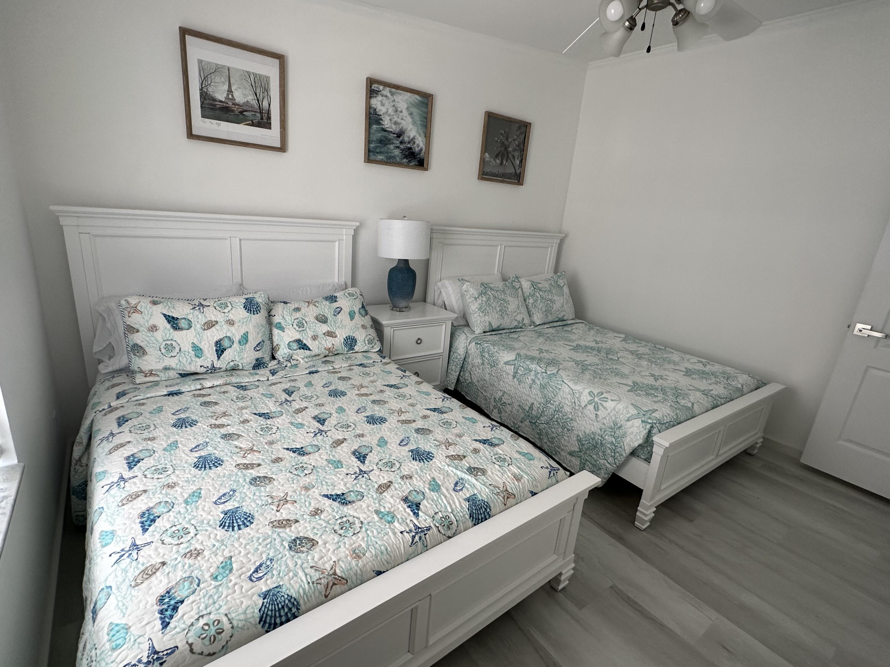 240 Taylor Drive Key Largo, FL 33037 - Photo 12 of 25 a bedroom with two beds and a night stand