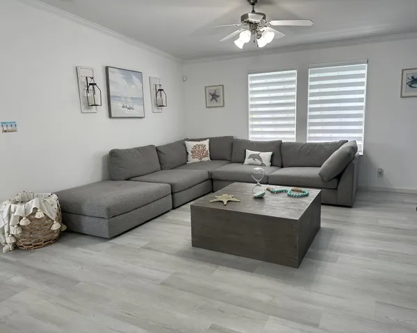 a living room with furniture and a window
