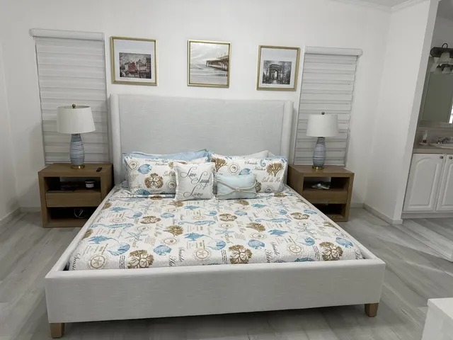 a bathroom with a sink double vanity and a mirror