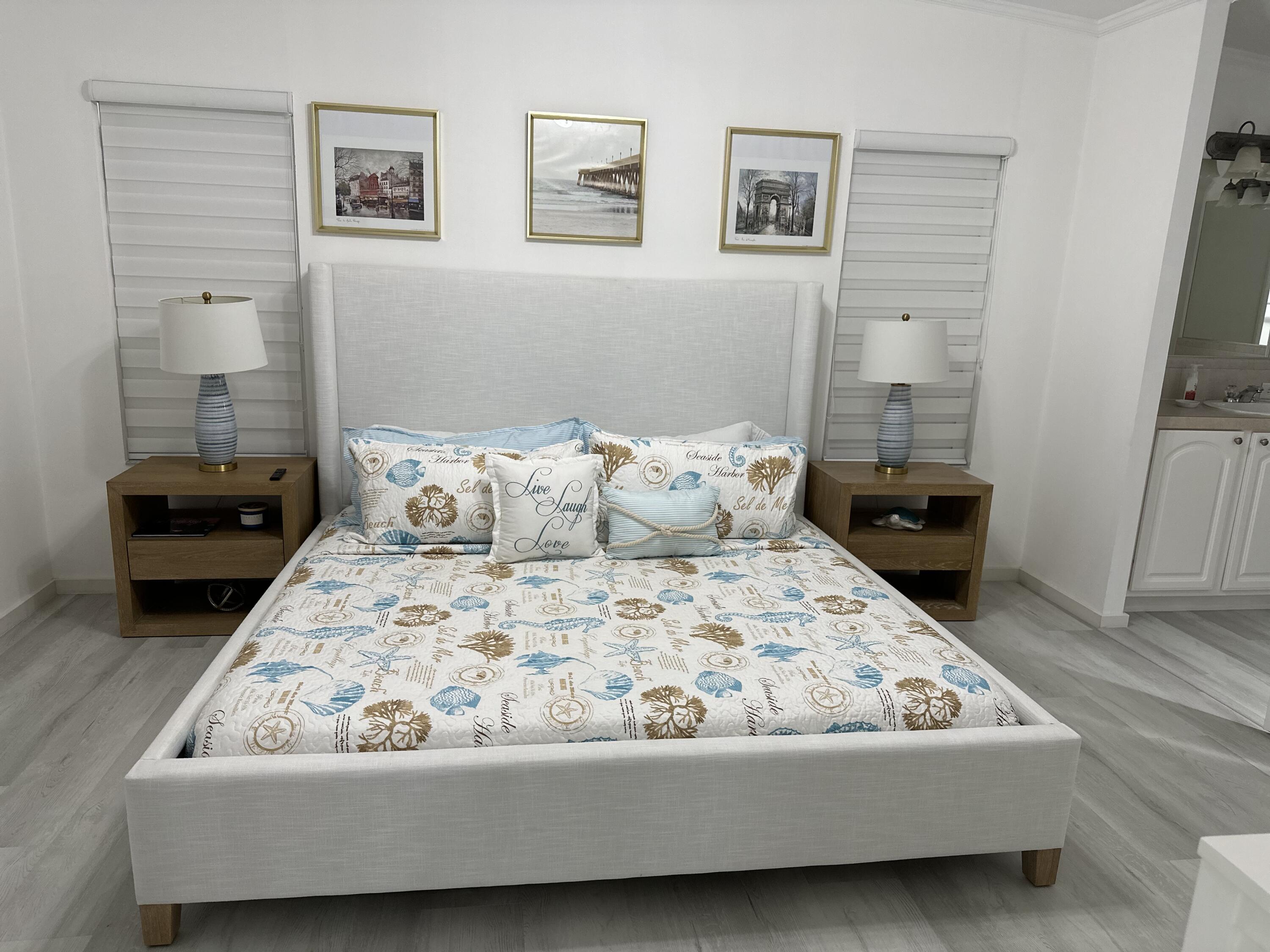 240 Taylor Drive Key Largo, FL 33037 - Photo 9 of 25 a bedroom with a bed and a couch