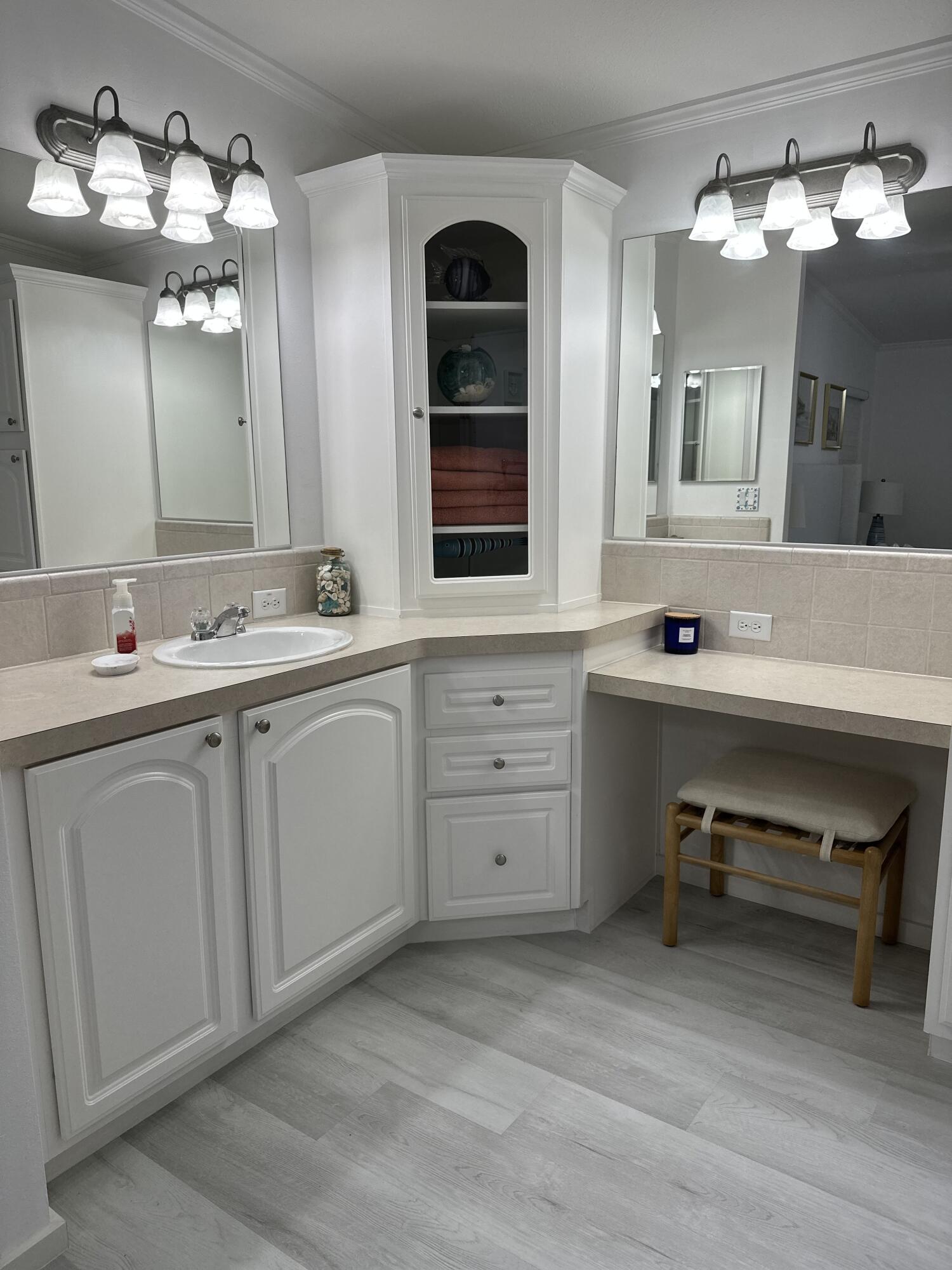 240 Taylor Drive Key Largo, FL 33037 - Photo 10 of 25 a bathroom with a sink double vanity and a mirror