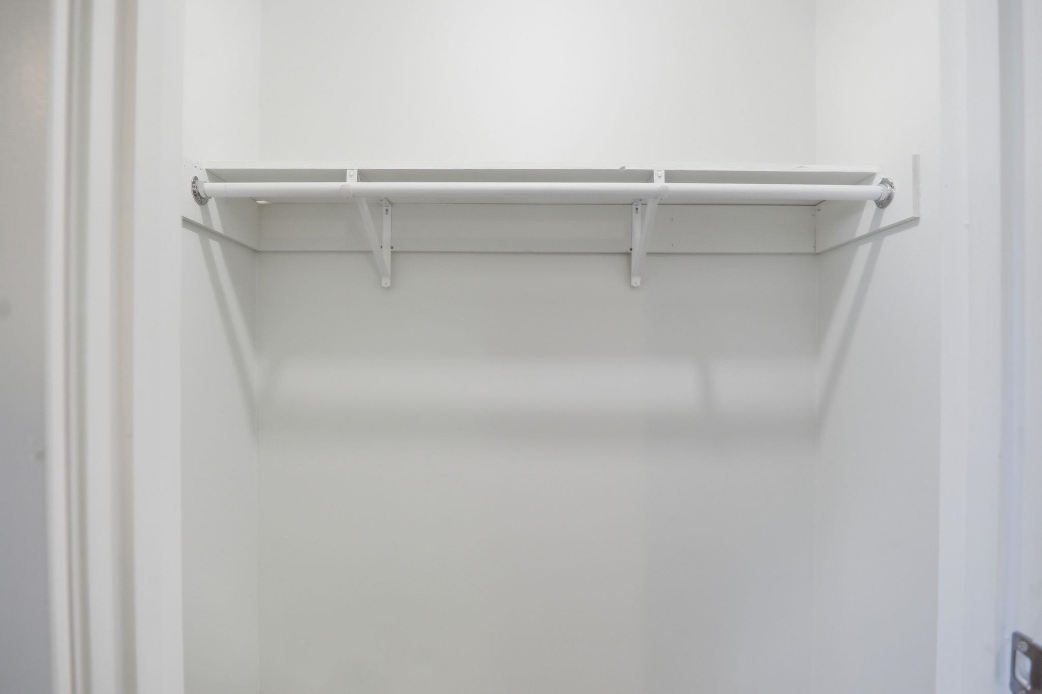 3113 Raleigh Ridge Cove Memphis, TN 38128 - Photo 31 of 38 White-painted closet featuring a single shelf and clothing rod