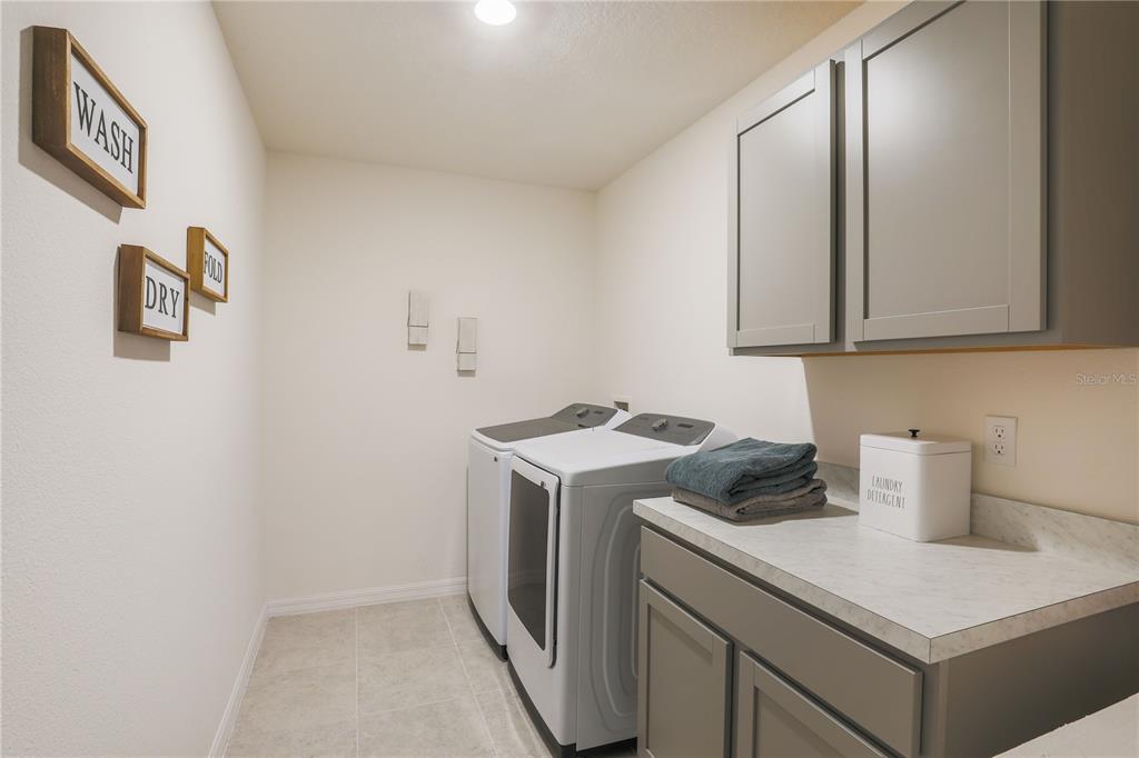 12 Hemlock Cir Way Ocala, FL 34472 - Photo 12 of 32 a utility room with dryer and washer