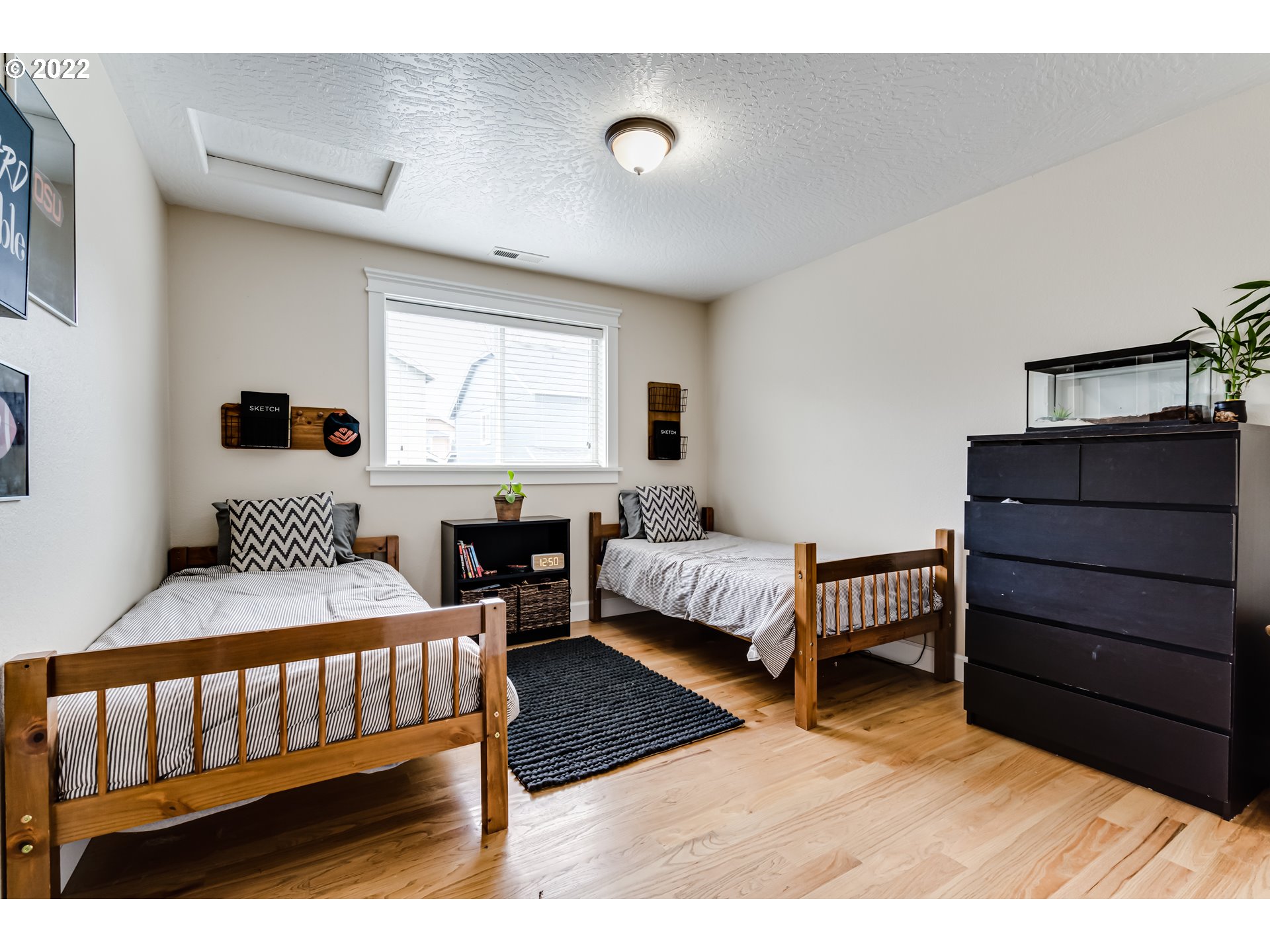 5722 Peridot Way Springfield, OR 97478 - Photo 18 of 27 a bedroom with furniture and a window