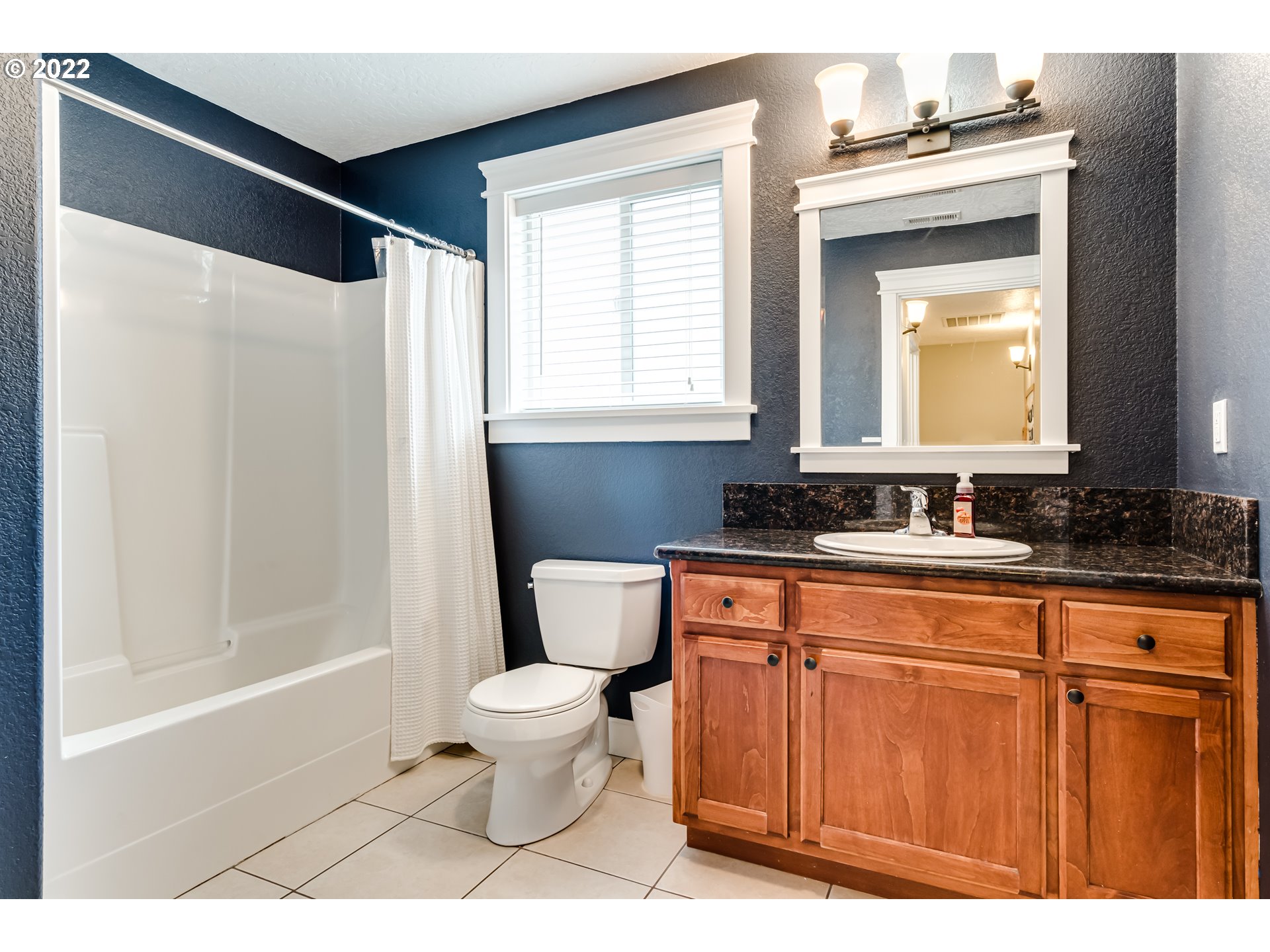5722 Peridot Way Springfield, OR 97478 - Photo 20 of 27 a bathroom with a sink a toilet and a bathtub
