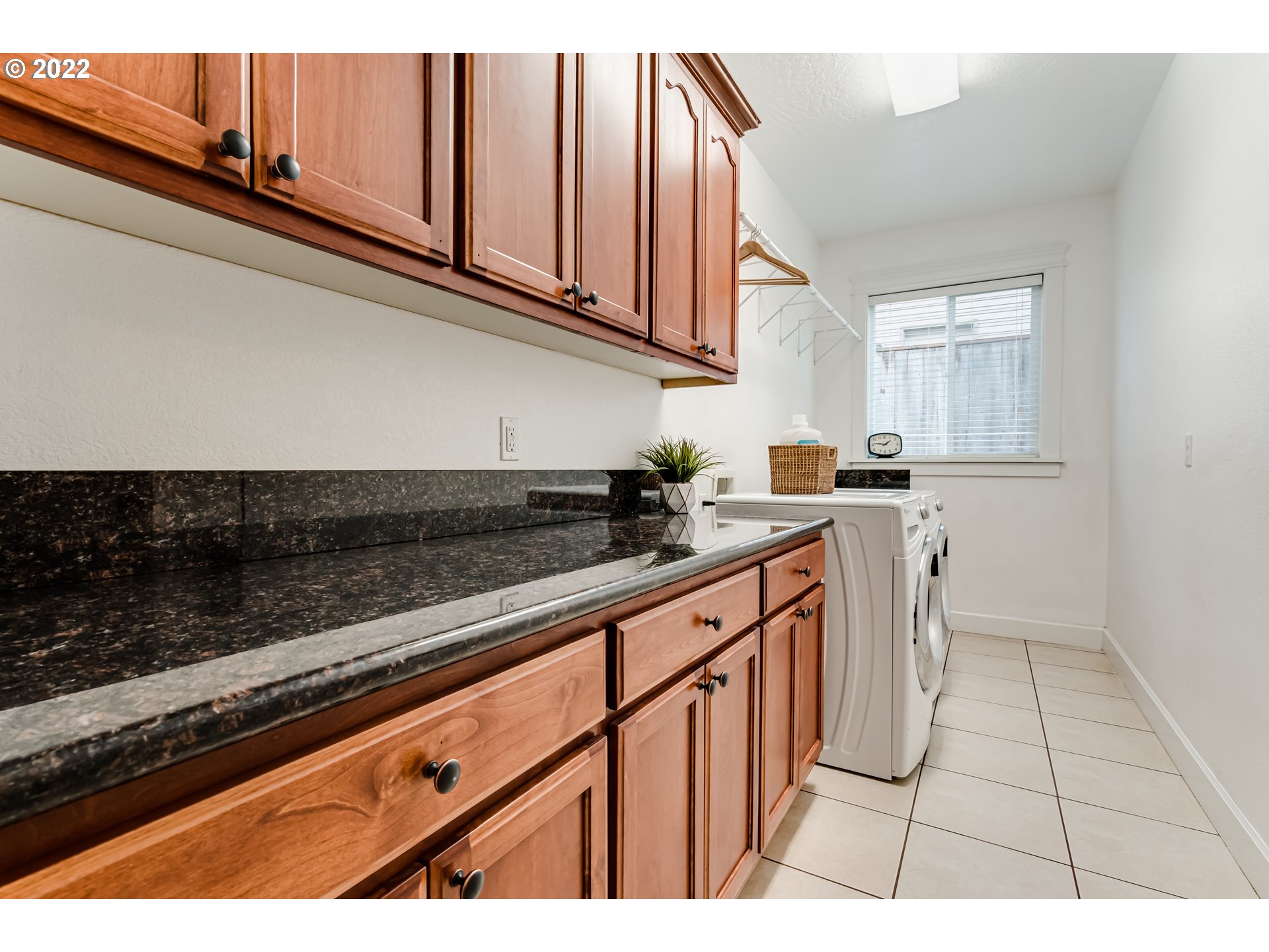 5722 Peridot Way Springfield, OR 97478 - Photo 21 of 27 a kitchen with stainless steel appliances granite countertop a sink and cabinets