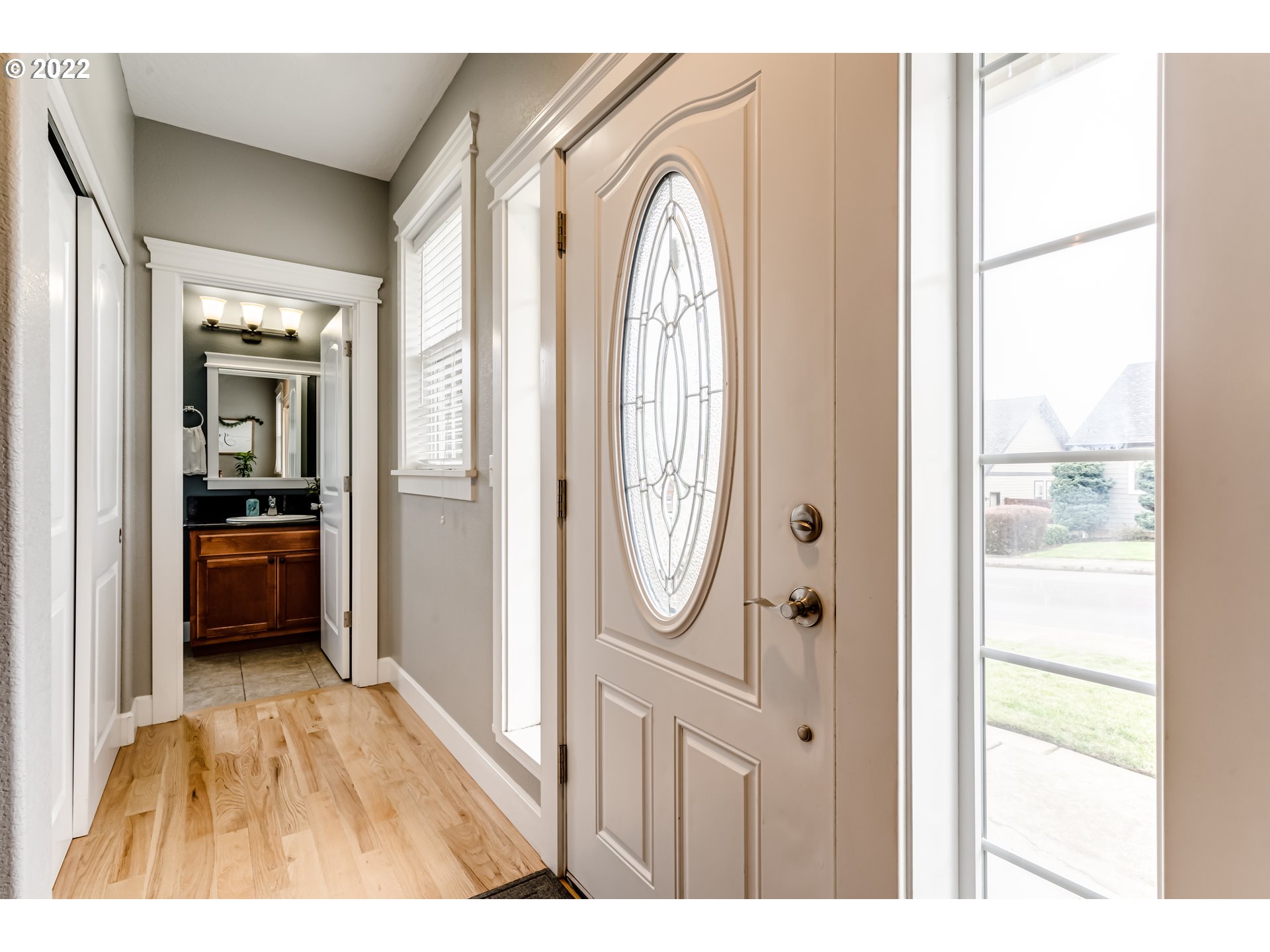 5722 Peridot Way Springfield, OR 97478 - Photo 23 of 27 a view of a hallway with wooden floor