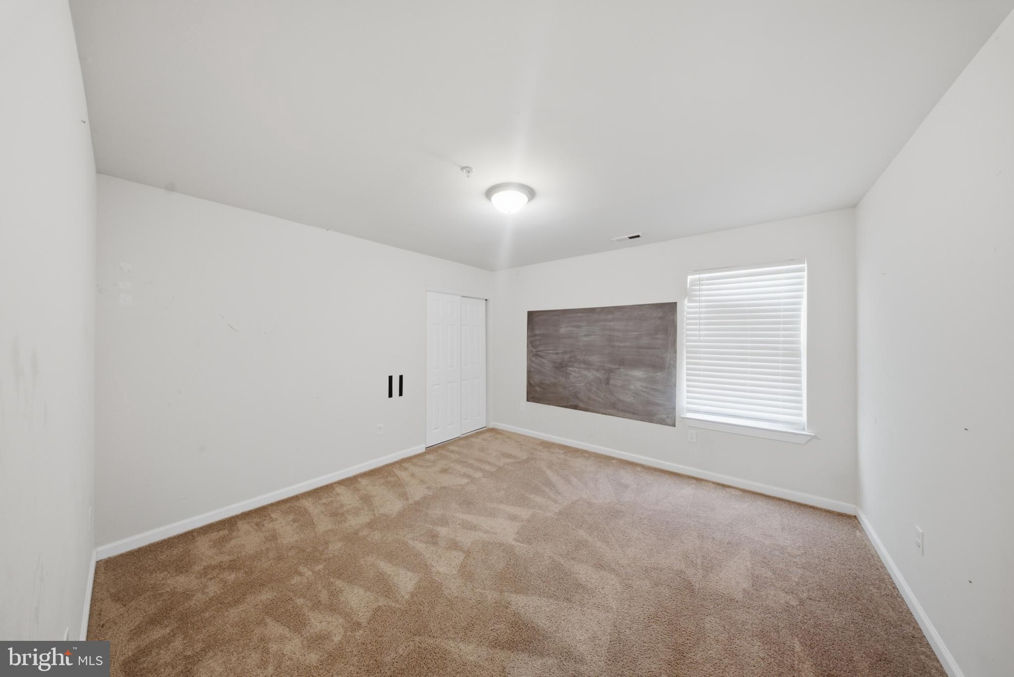 7611 Temple Hill Road Temple Hills, MD 20748 - Photo 15 of 25 a view of an empty room with a window