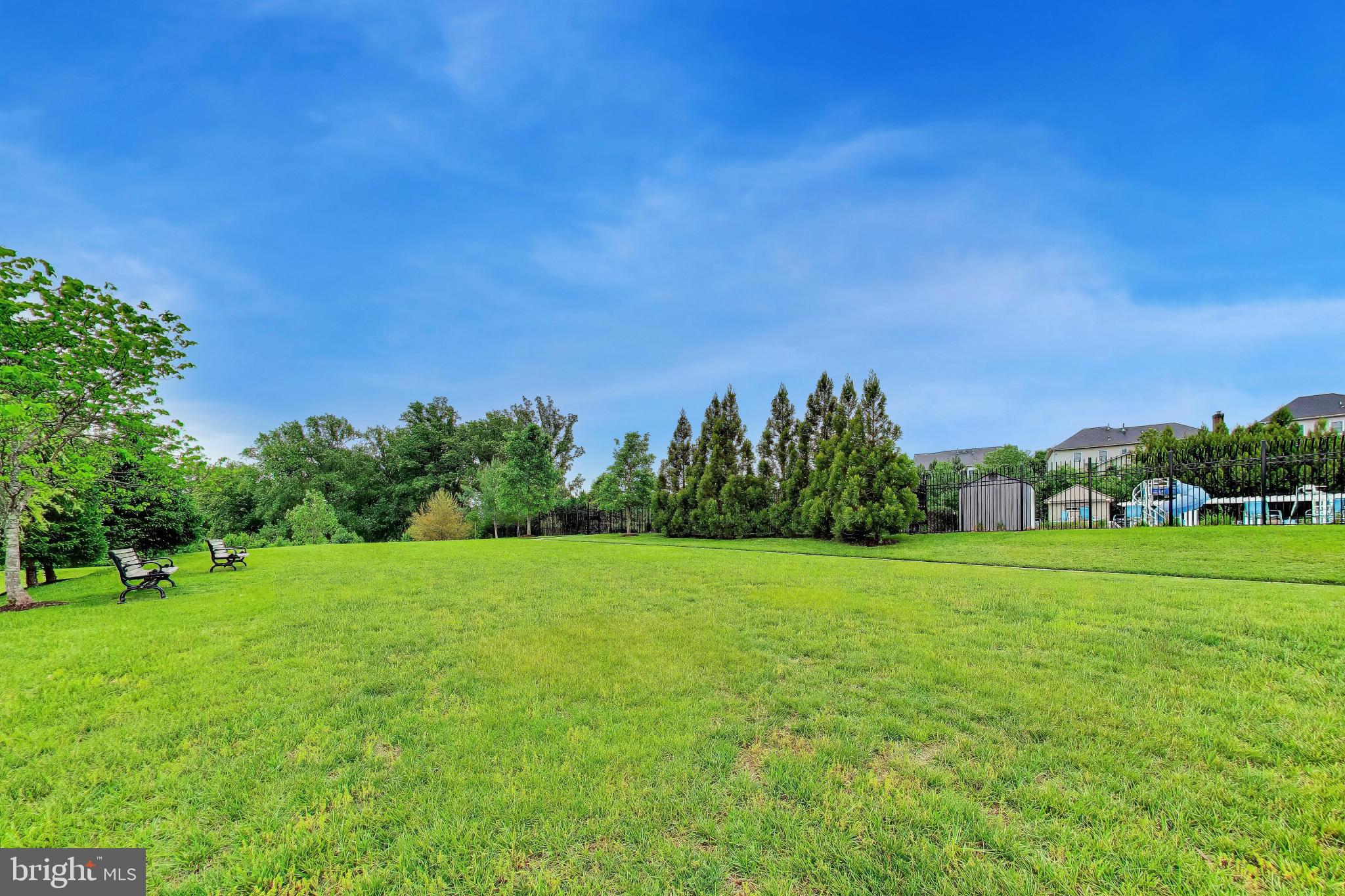 13513 Moonlight Trail Drive Silver Spring, MD 20906 - Photo 69 of 78 a view of a grassy field with trees