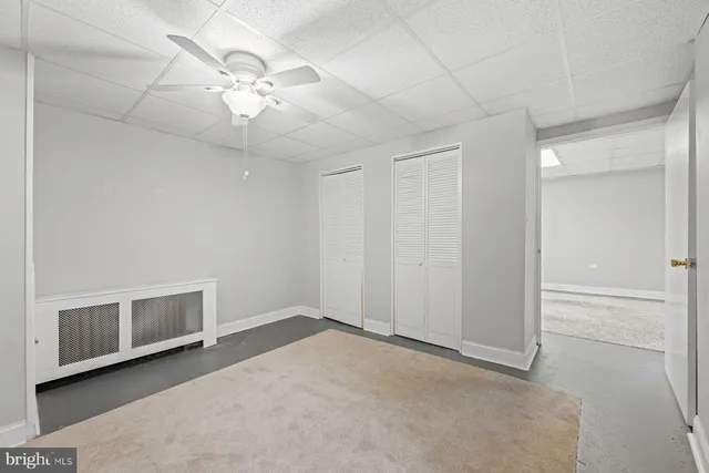 a bathroom with a toilet and a bathtub