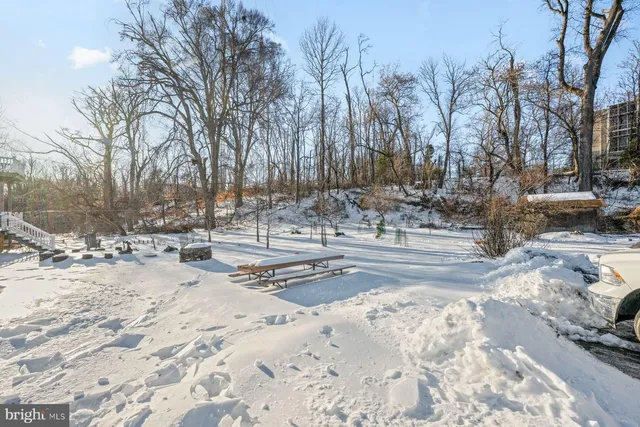a view of fireplace and window