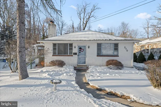 a picture of a room with a white wall and white walls