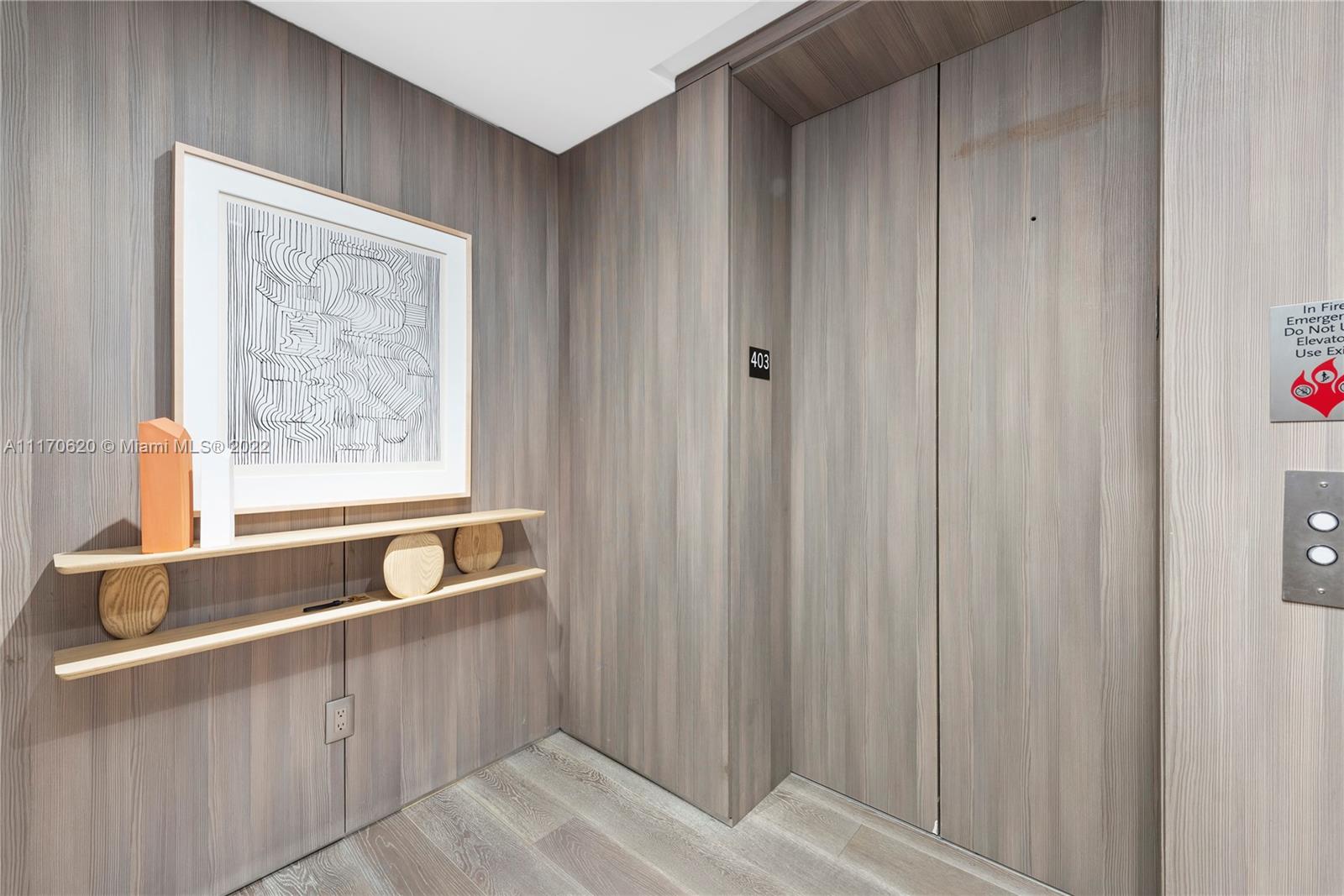 a view of a door and an entryway in a kitchen