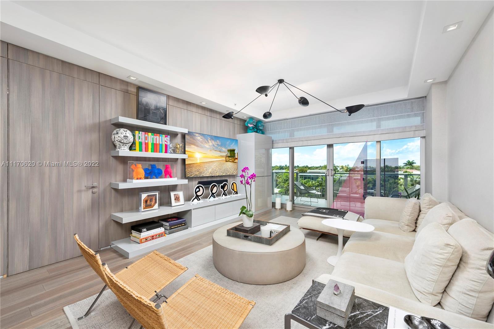 350 Ocean Drive, Unit 403N Key Biscayne, FL 33149 - Photo 16 of 55 a room with furniture and a large window