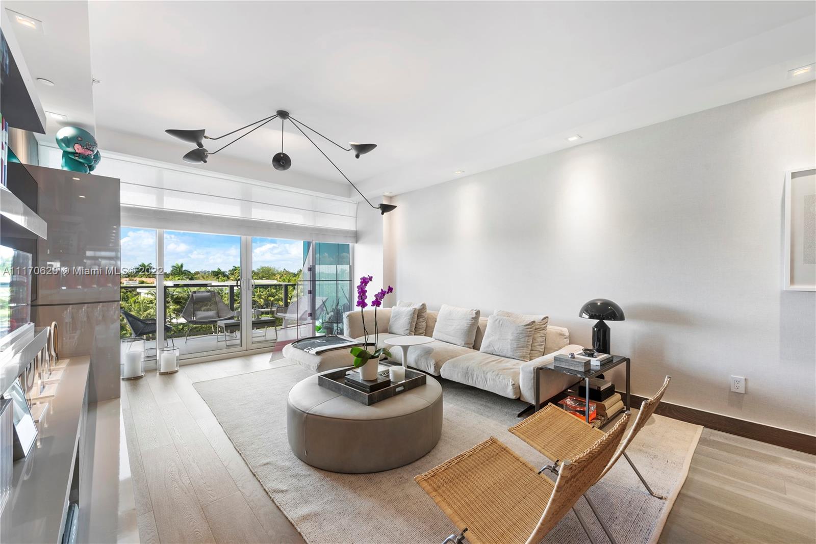 350 Ocean Drive, Unit 403N Key Biscayne, FL 33149 - Photo 19 of 55 a living room with furniture and a large window