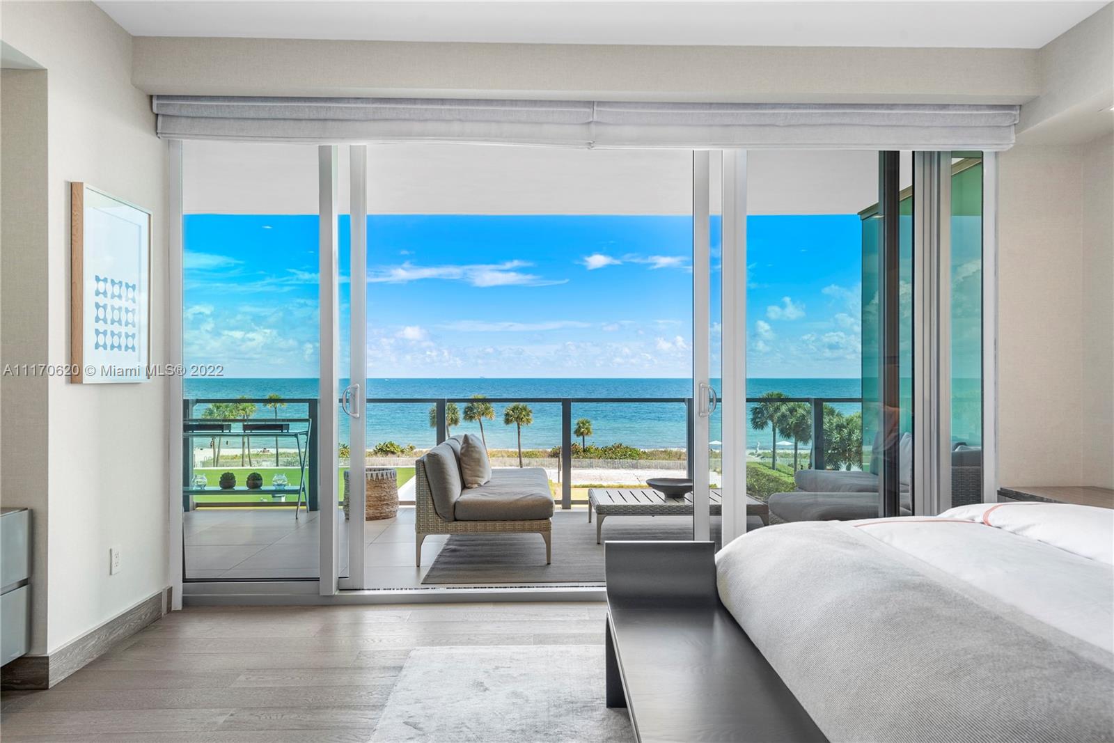 350 Ocean Drive, Unit 403N Key Biscayne, FL 33149 - Photo 22 of 55 a bedroom with furniture and large window
