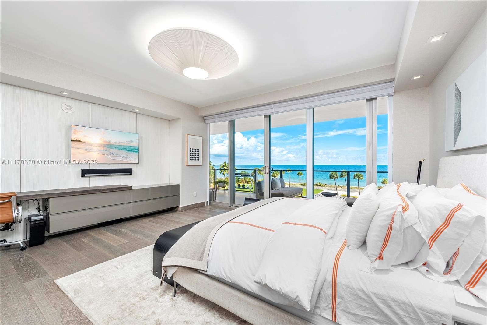 350 Ocean Drive, Unit 403N Key Biscayne, FL 33149 - Photo 25 of 55 a bed room with a bed and a large window