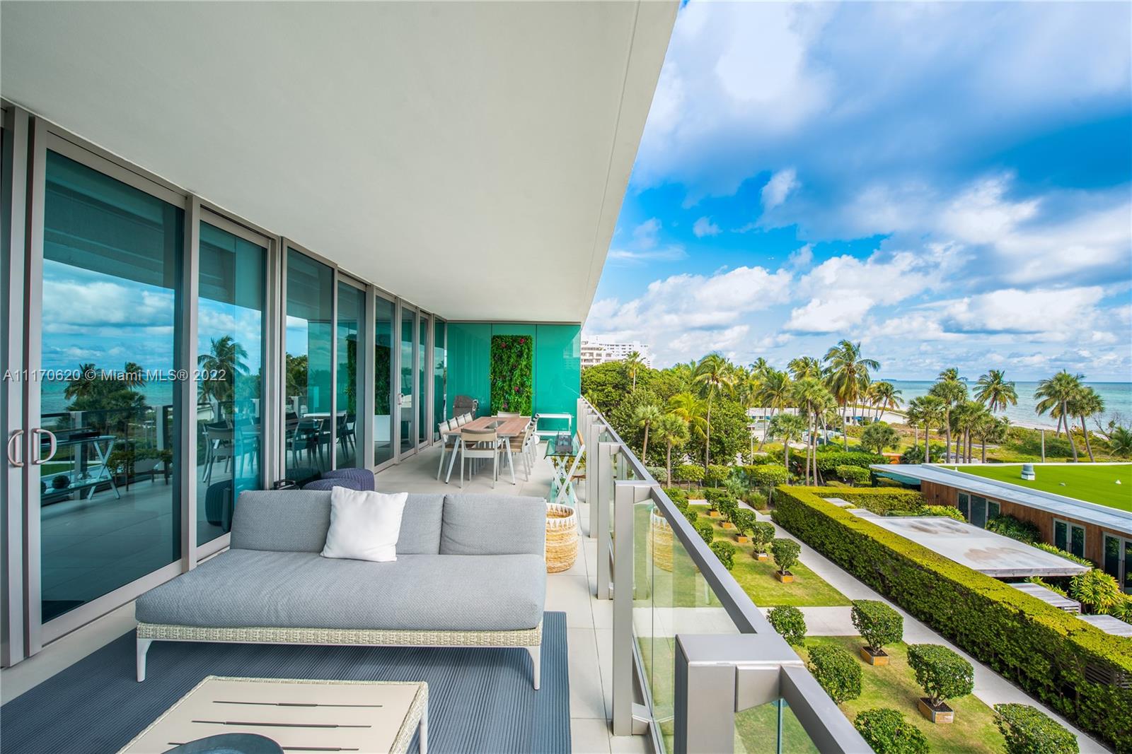 350 Ocean Drive, Unit 403N Key Biscayne, FL 33149 - Photo 38 of 55 a view of balcony with furniture and garden