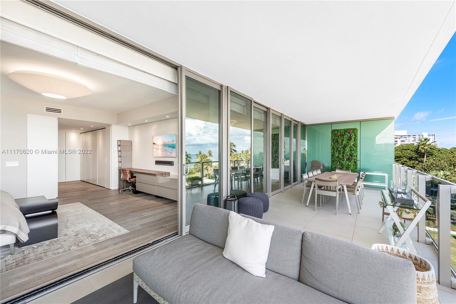 350 Ocean Drive, Unit 403N Key Biscayne, FL 33149 - Photo 39 of 55 a living room with furniture and a large window