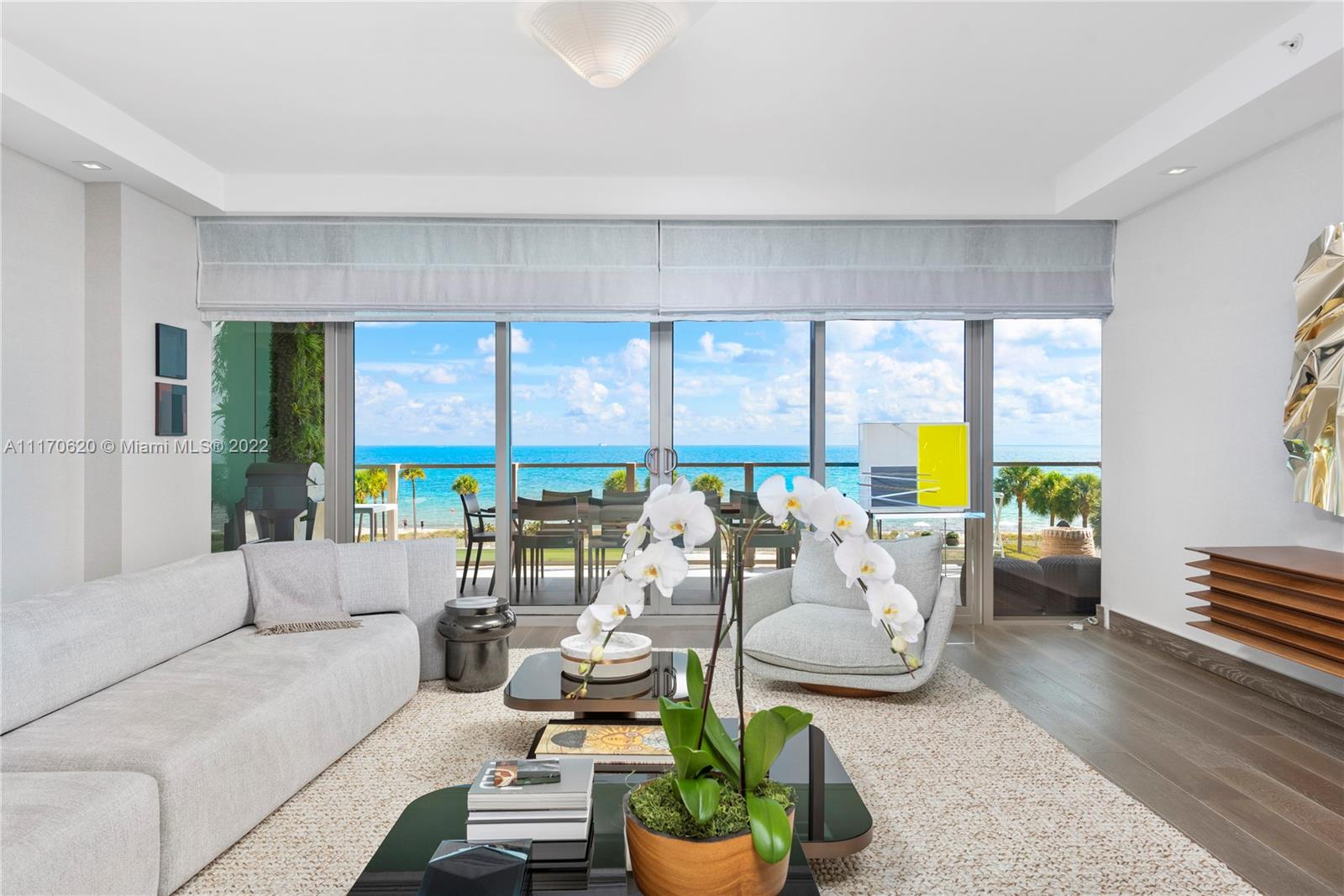 350 Ocean Drive, Unit 403N Key Biscayne, FL 33149 - Photo 9 of 55 a living room with furniture and a large window