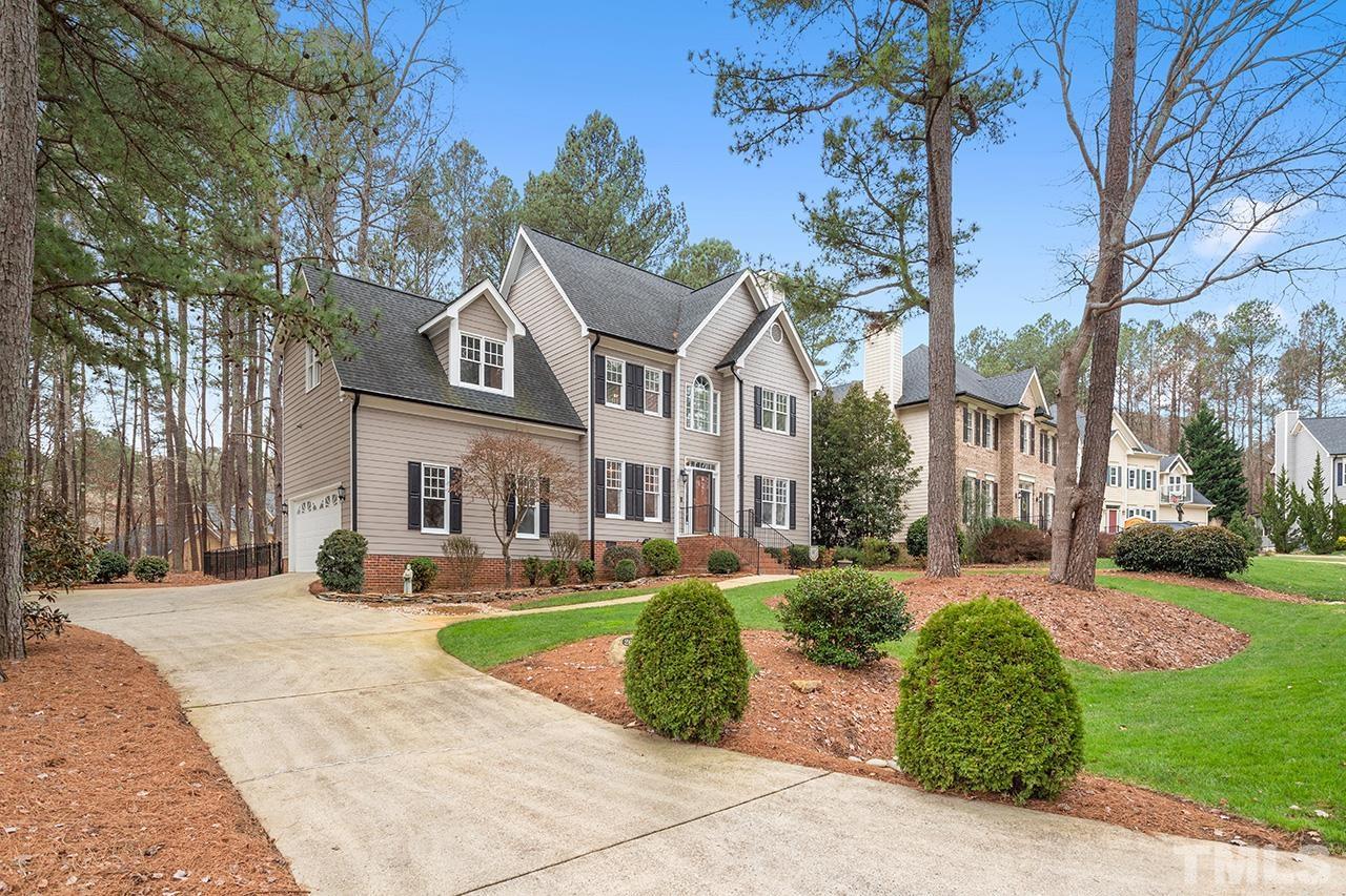 2625 Jasper Lane Raleigh, NC 27613 - Photo 3 of 40 a front view of a house with a garden