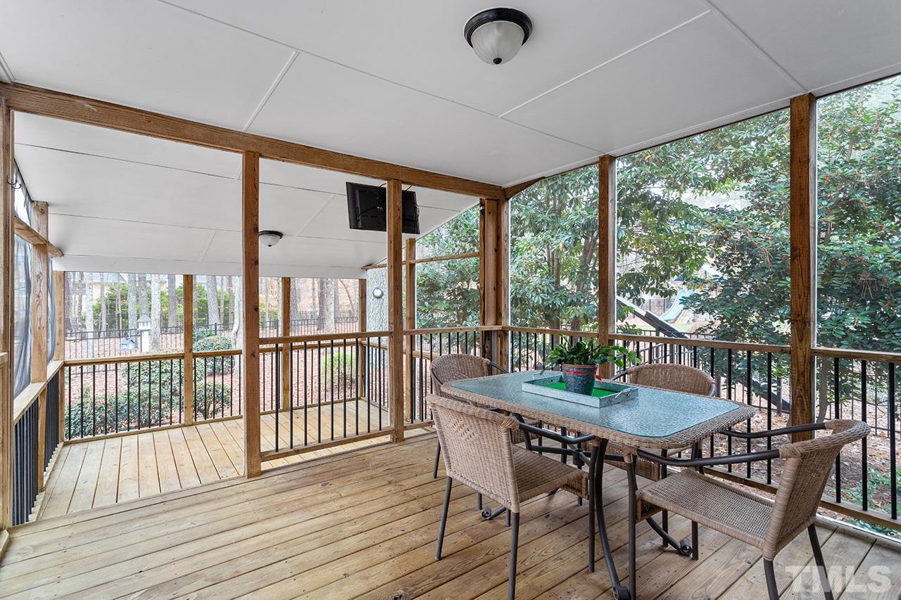 2625 Jasper Lane Raleigh, NC 27613 - Photo 10 of 40 a view of a dining room with furniture window and wooden floor