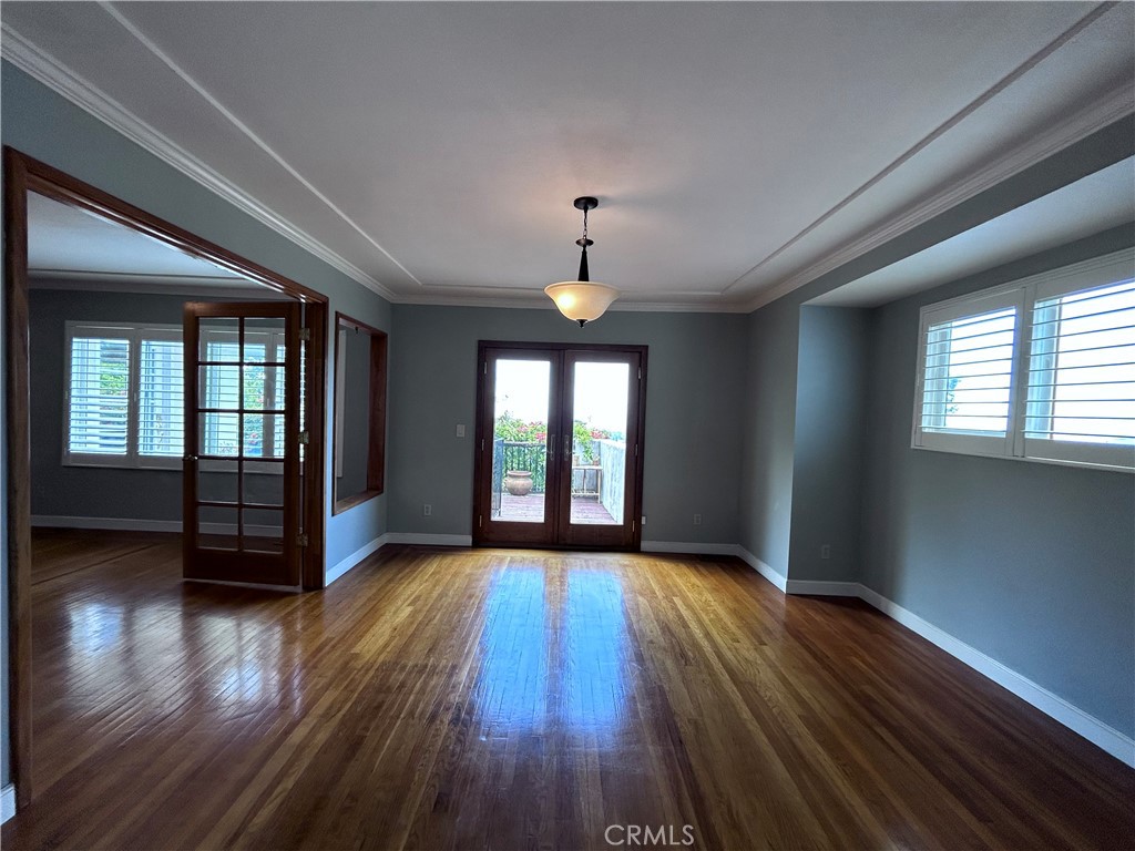 1009 Keith Avenue Berkeley, CA 94708 - Photo 14 of 36 a view of wooden floor and windows in a room