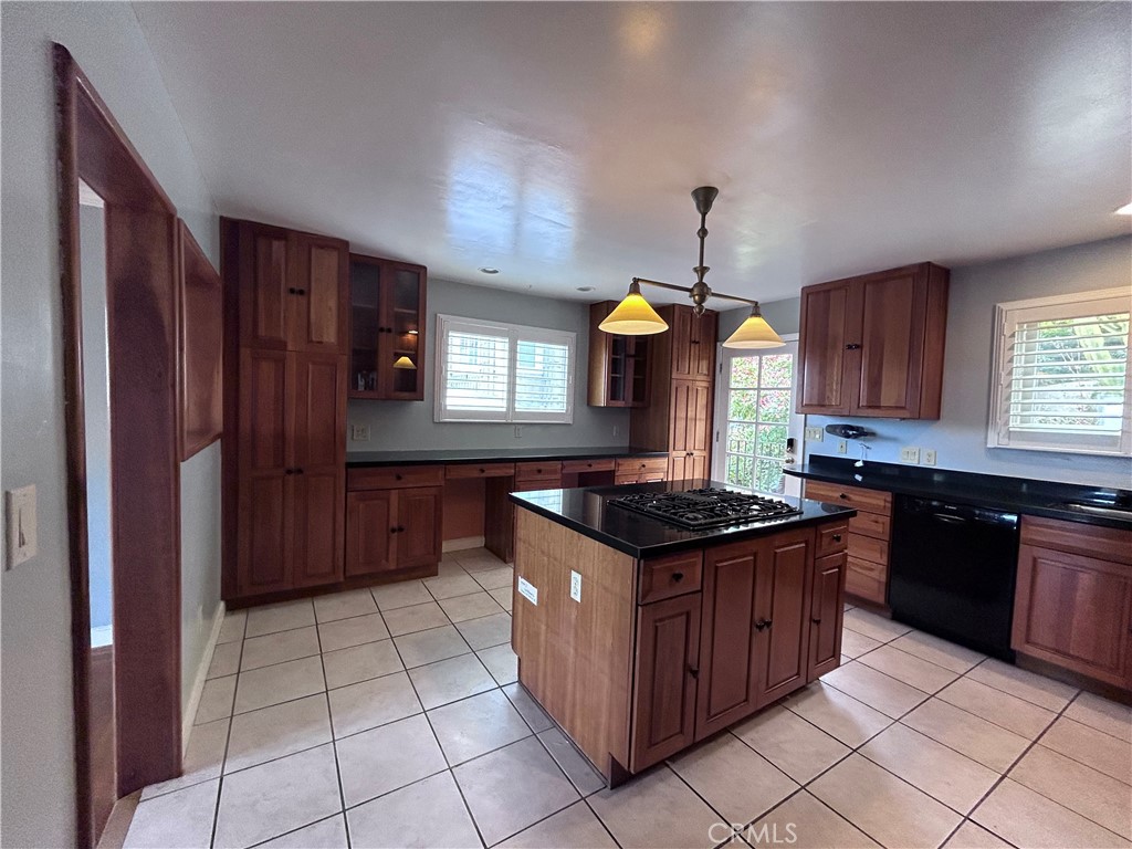 1009 Keith Avenue Berkeley, CA 94708 - Photo 16 of 36 a kitchen with stainless steel appliances granite countertop a stove a sink and a refrigerator