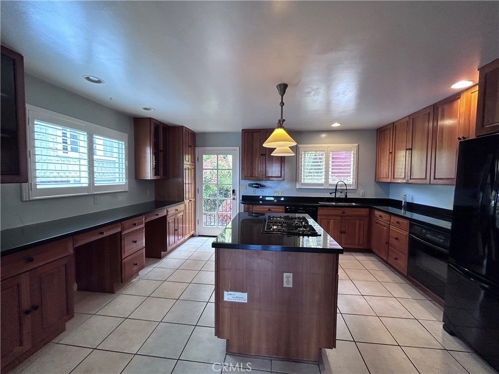 1009 Keith Avenue Berkeley, CA 94708 - Photo 17 of 36 a kitchen with a sink a counter space and a window