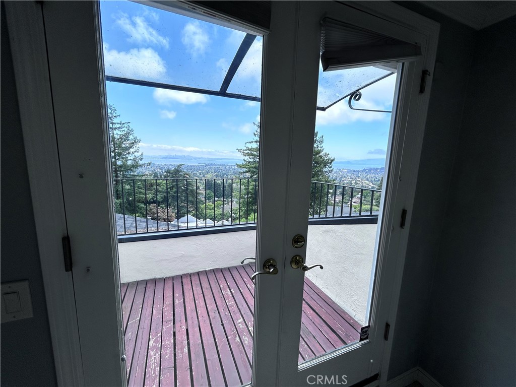 1009 Keith Avenue Berkeley, CA 94708 - Photo 23 of 36 a view of a room with wooden floor and a window