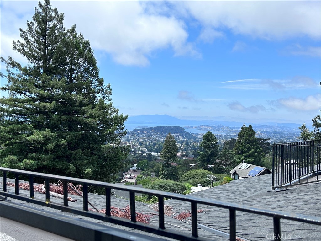 1009 Keith Avenue Berkeley, CA 94708 - Photo 25 of 36 a view of a balcony with wooden floor and fence