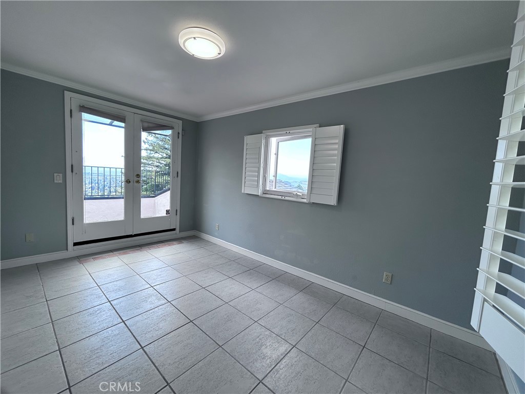 1009 Keith Avenue Berkeley, CA 94708 - Photo 28 of 36 an empty room with windows