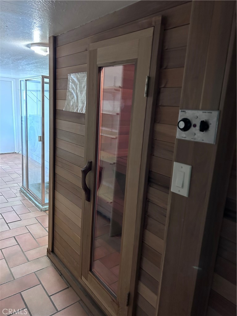 1009 Keith Avenue Berkeley, CA 94708 - Photo 33 of 36 a bathroom with a glass door shower
