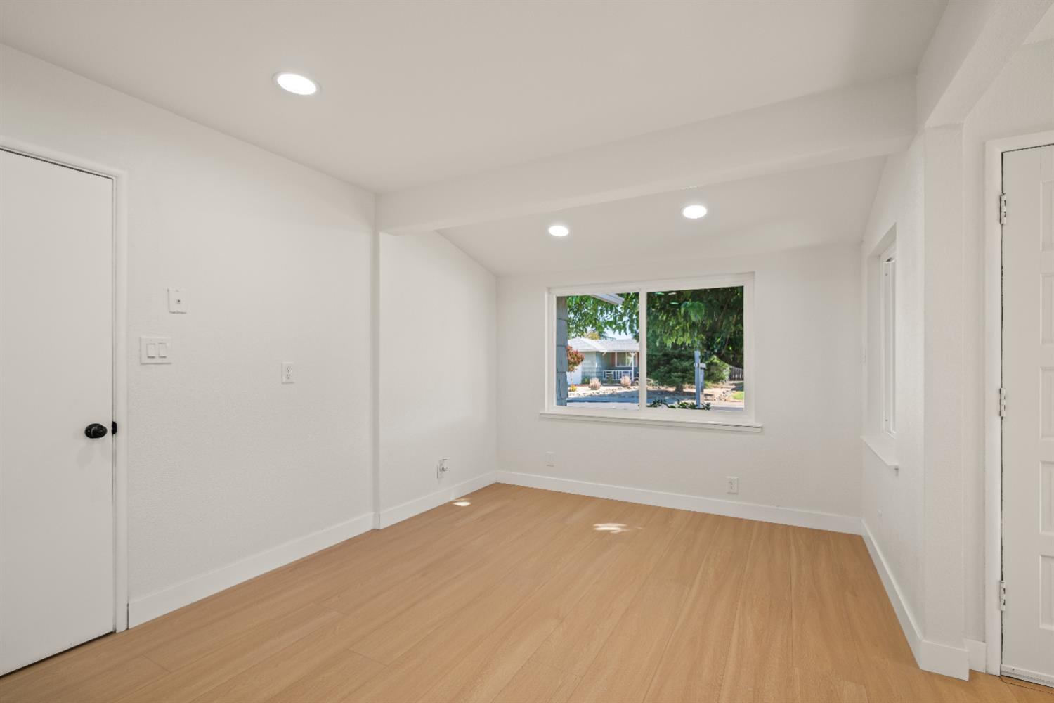 2628 Tronero Way Rancho Cordova, CA 95670 - Photo 11 of 31 a view of an empty room with a window