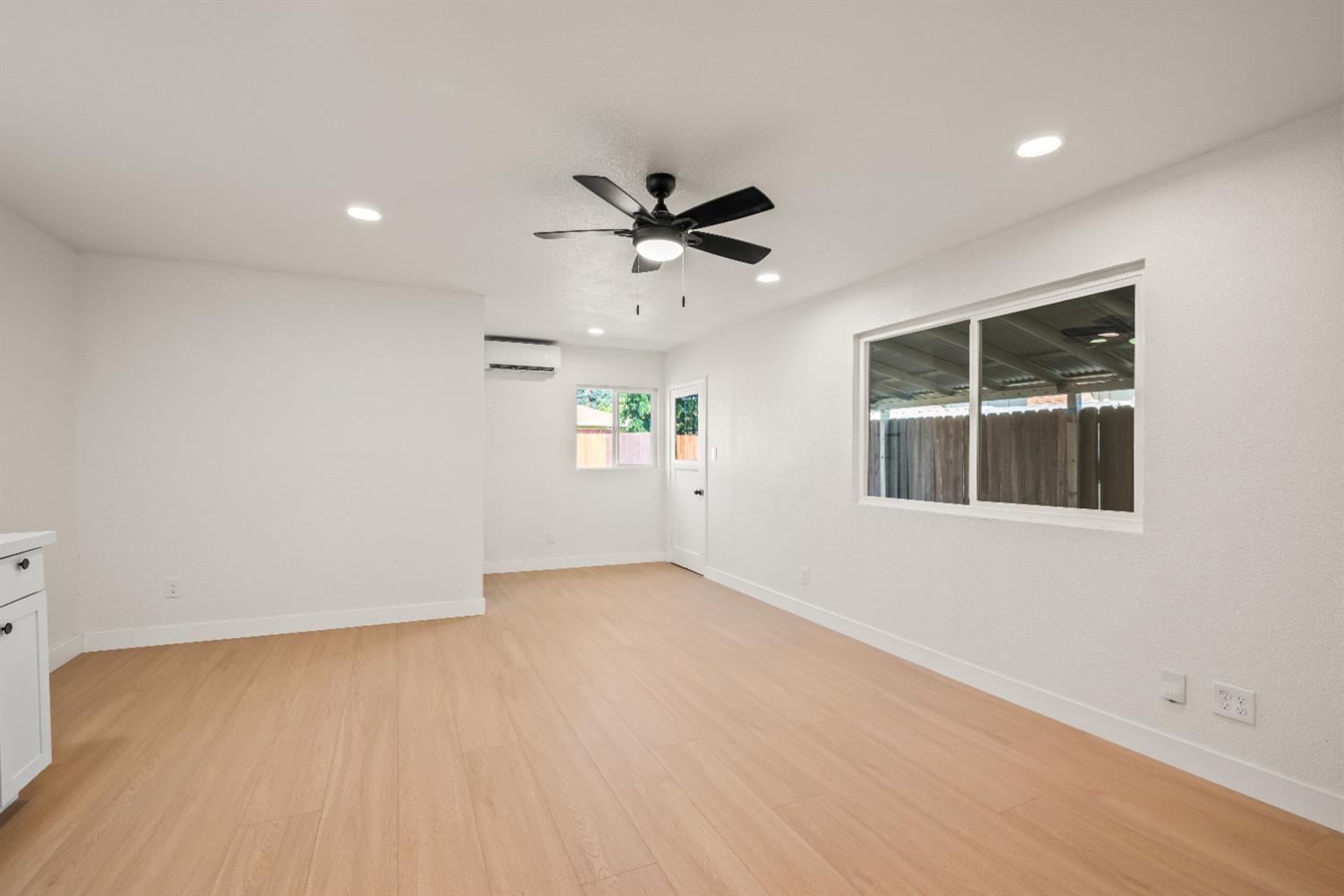 2628 Tronero Way Rancho Cordova, CA 95670 - Photo 21 of 31 an empty room with a window and a ceiling fan