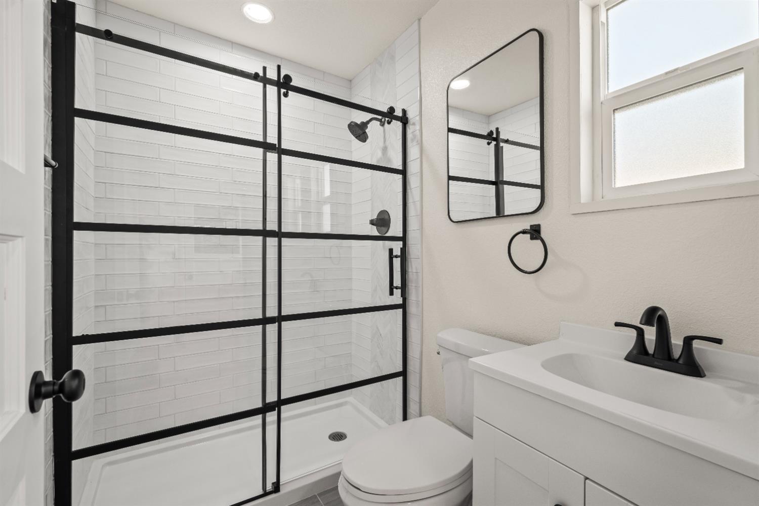 2628 Tronero Way Rancho Cordova, CA 95670 - Photo 25 of 31 a bathroom with a toilet a sink and a shower