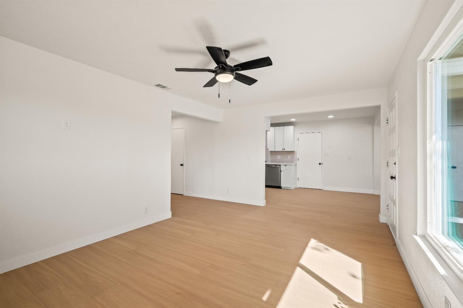 2628 Tronero Way Rancho Cordova, CA 95670 - Photo 5 of 31 a view of an empty room with a window