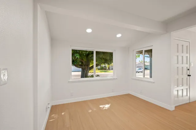 an empty room with windows