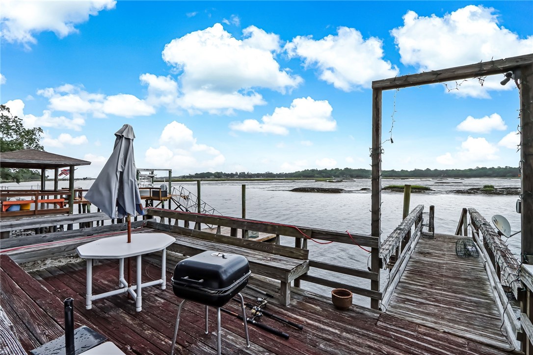 96270 Willyoung Road Yulee, FL 32097 - Photo 2 of 9 a view of a balcony with furniture