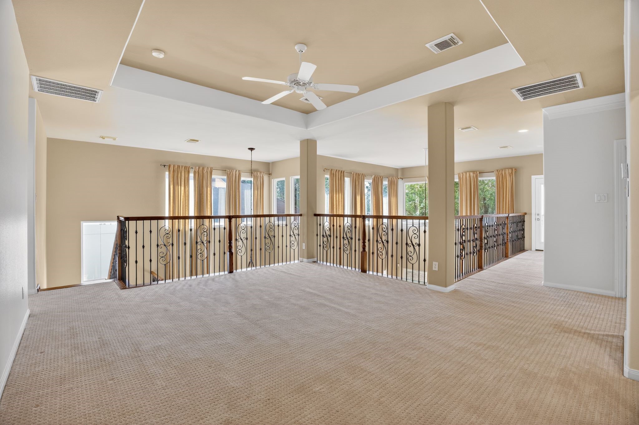 11511 Gallant Ridge Lane Houston, TX 77082 - Photo 29 of 49 a view of a bedroom with a large window and chandelier