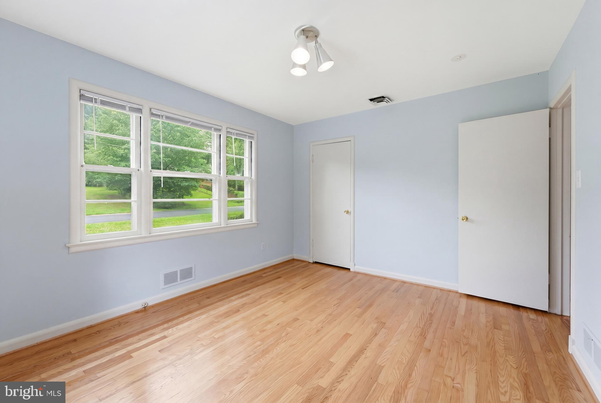 228 Northwest Terrace Silver Spring, MD 20901 - Photo 34 of 70 a view of empty room with wooden floor and fan