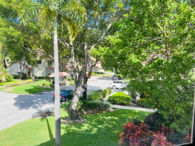 5621 Coach House Circle Boca Raton, FL 33486 - Photo 4 of 26 VIEW FROM KITCHEN WINDOW