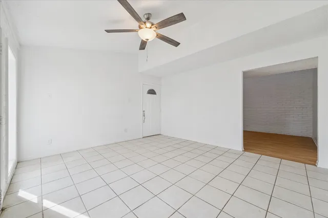 an empty room with fan